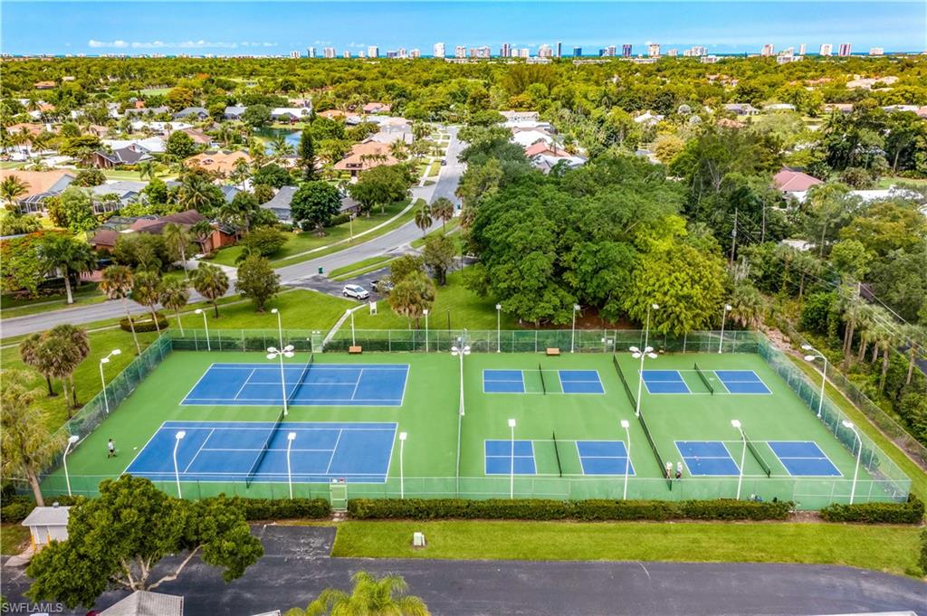 1350 Misty Pines Circle, Unit 204 Naples, FL 34105 - Photo 19 of 19 a view of a city