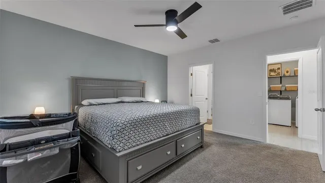 a bathroom with a shower and a sink