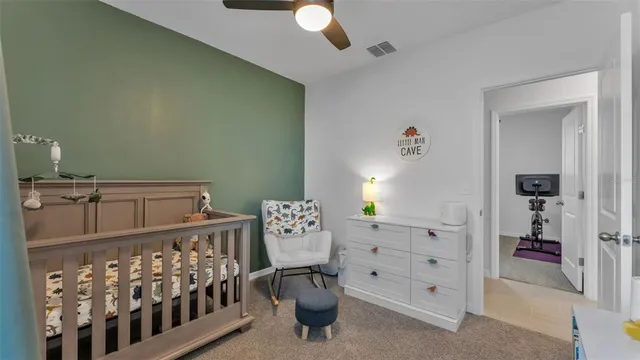 a view of workspace with furniture and wooden floor