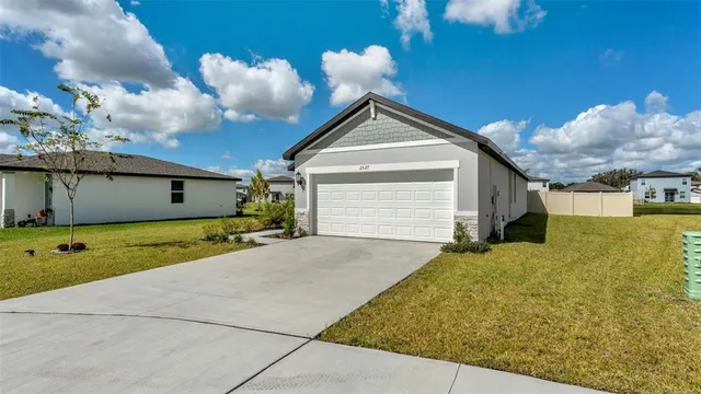 a view of an swimming pool and a yard