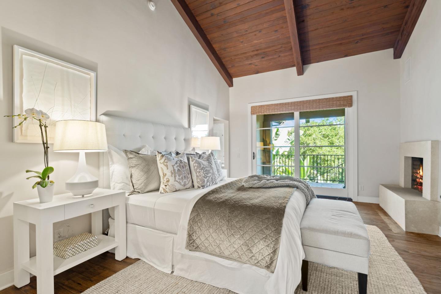 1056 Cascade Drive Menlo Park, CA 94025 - Photo 15 of 32 a living room with a bed furniture flat screen tv and a large window