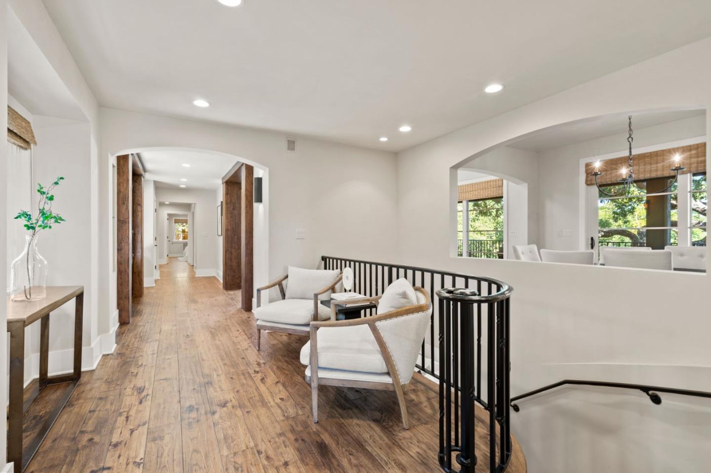 1056 Cascade Drive Menlo Park, CA 94025 - Photo 4 of 32 a view of a hallway with wooden floor and windows
