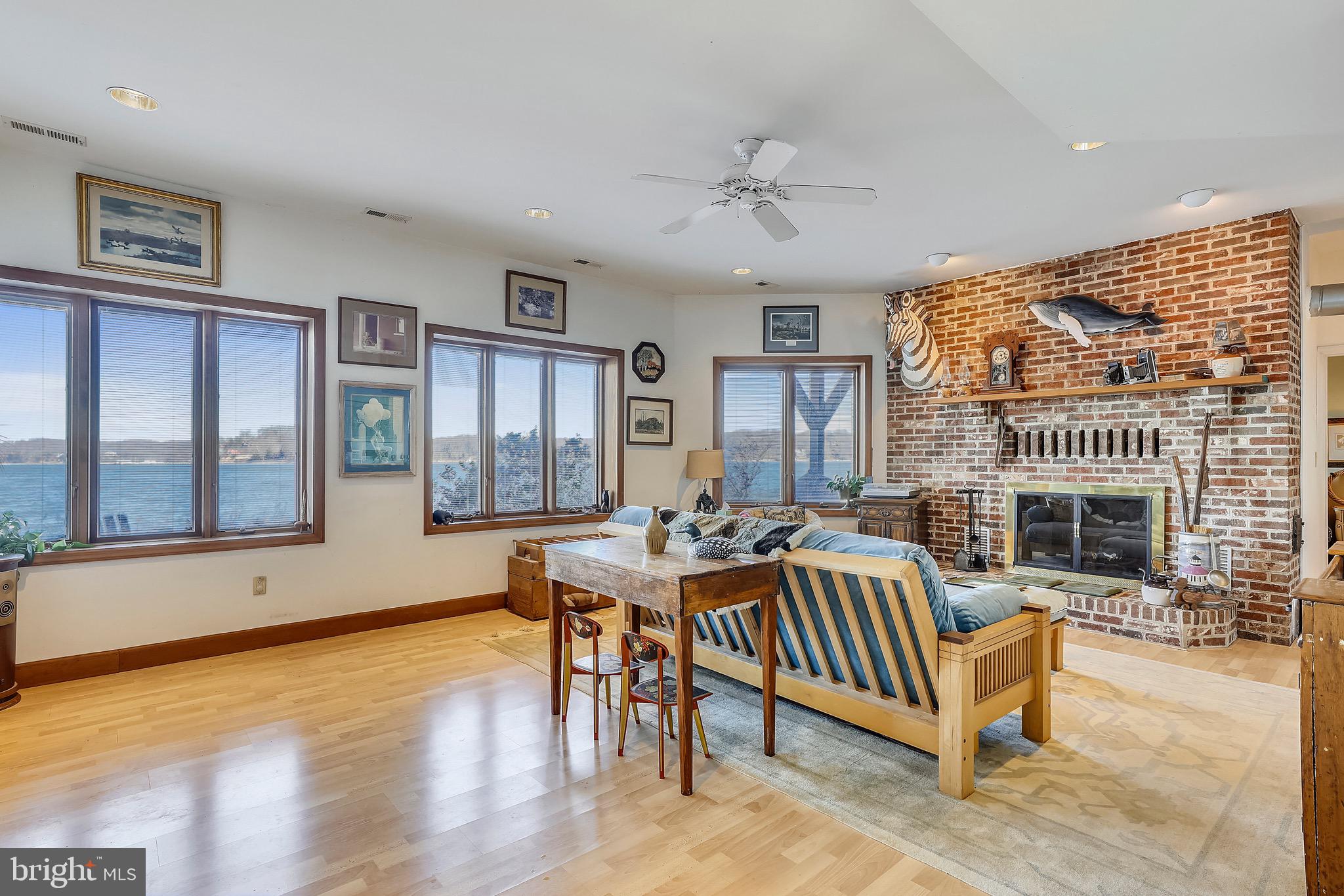 3 Beach Road Annapolis, MD 21405 - Photo 4 of 55 Lower Level Family Room, Fireplace & Water Views