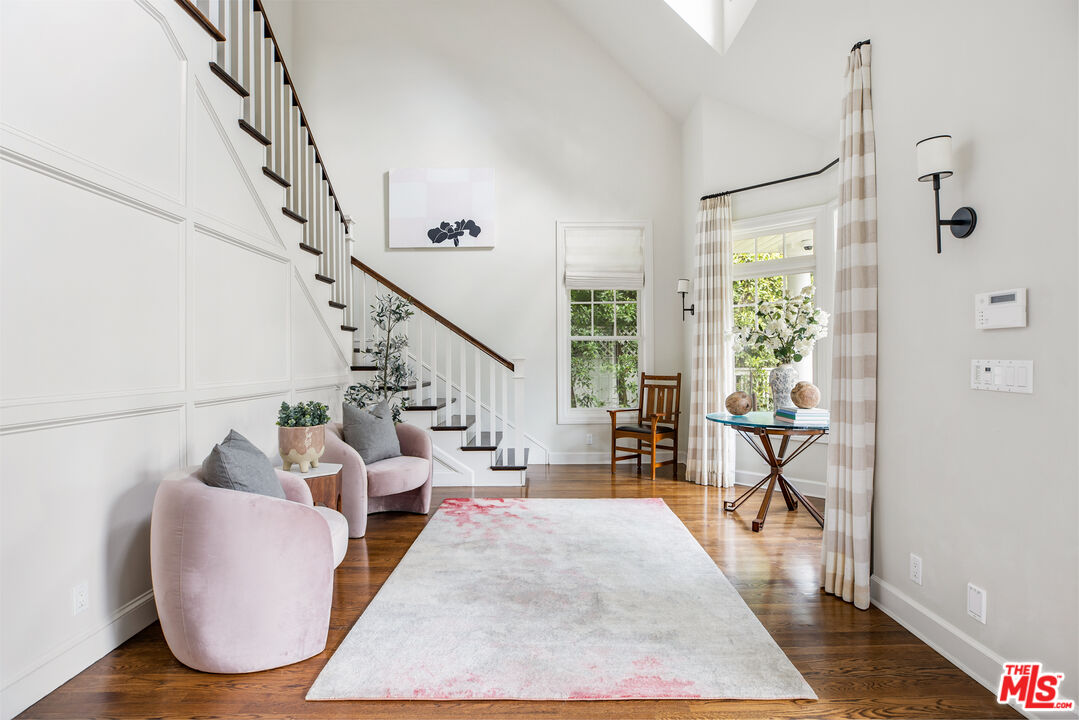 342 10th Street Santa Monica, CA 90402 - Photo 8 of 53 a living room with furniture and wooden floor