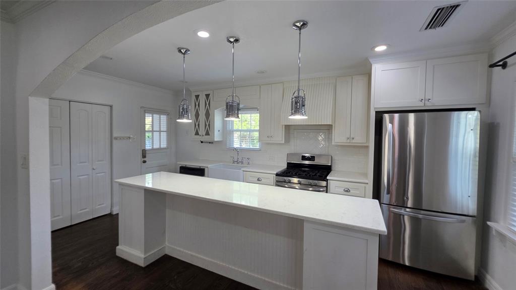3741 Hilltop Road Fort Worth, TX 76109 - Photo 2 of 26 Kitchen island works as a breakfast bar