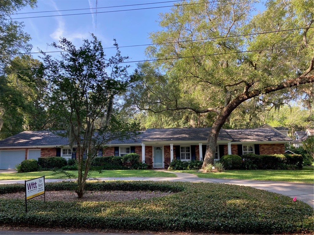 Brick ranch on private double lot