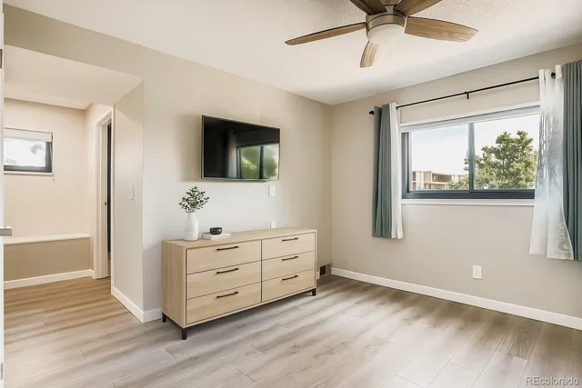 a room with furniture and flat screen tv