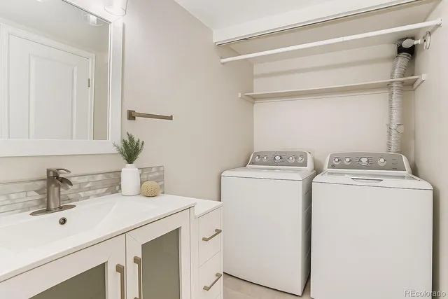 a utility room with dryer and washer