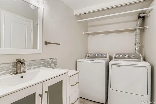a utility room with dryer and washer
