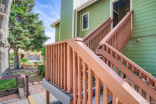 a view of outdoor space with deck and backyard