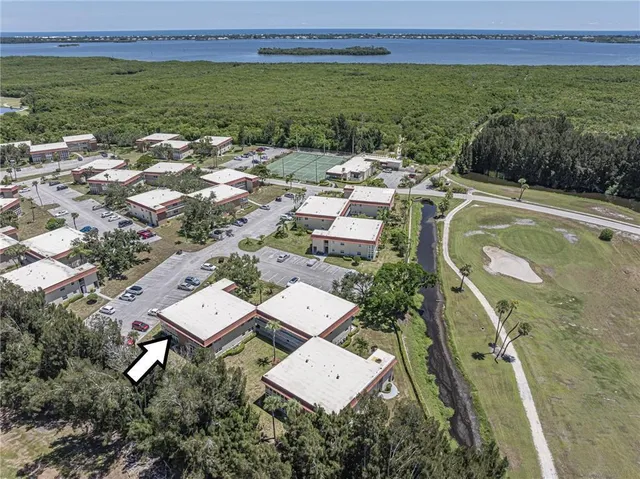 an aerial view of a house with a garden