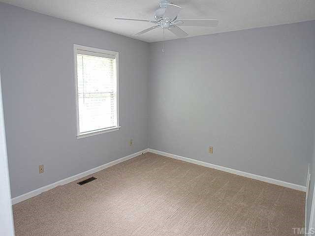 2214 Alpine Road Durham, NC 27707 - Photo 6 of 9 Brand new neutral carpet has been installed upstairs and down. This is one of two potential Master Bedrooms. The interior has just been painted in appealing neutral colors.