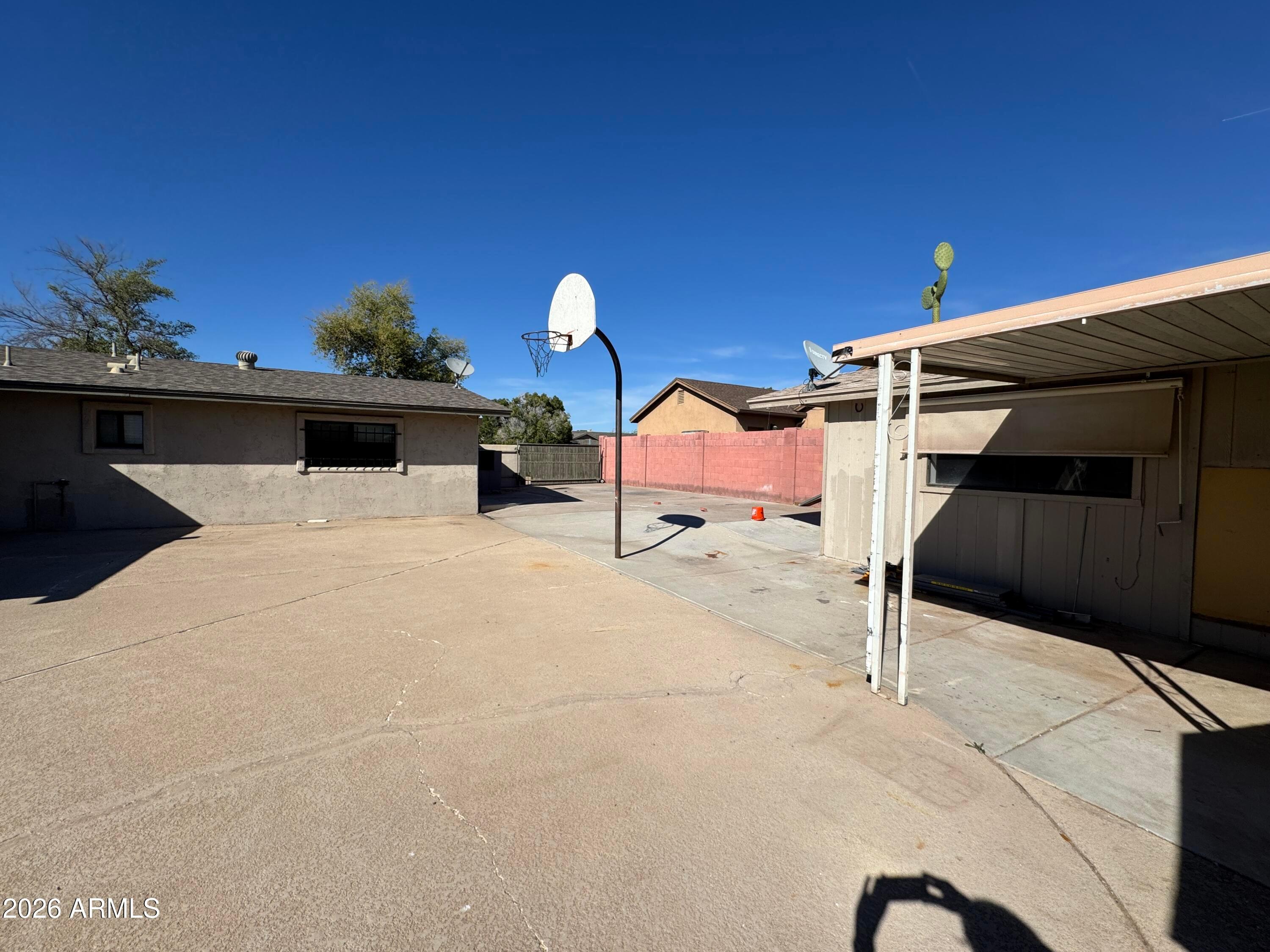 6317 East McLellan Road Mesa, AZ 85205 - Photo 19 of 28 a front view of a house with a yard