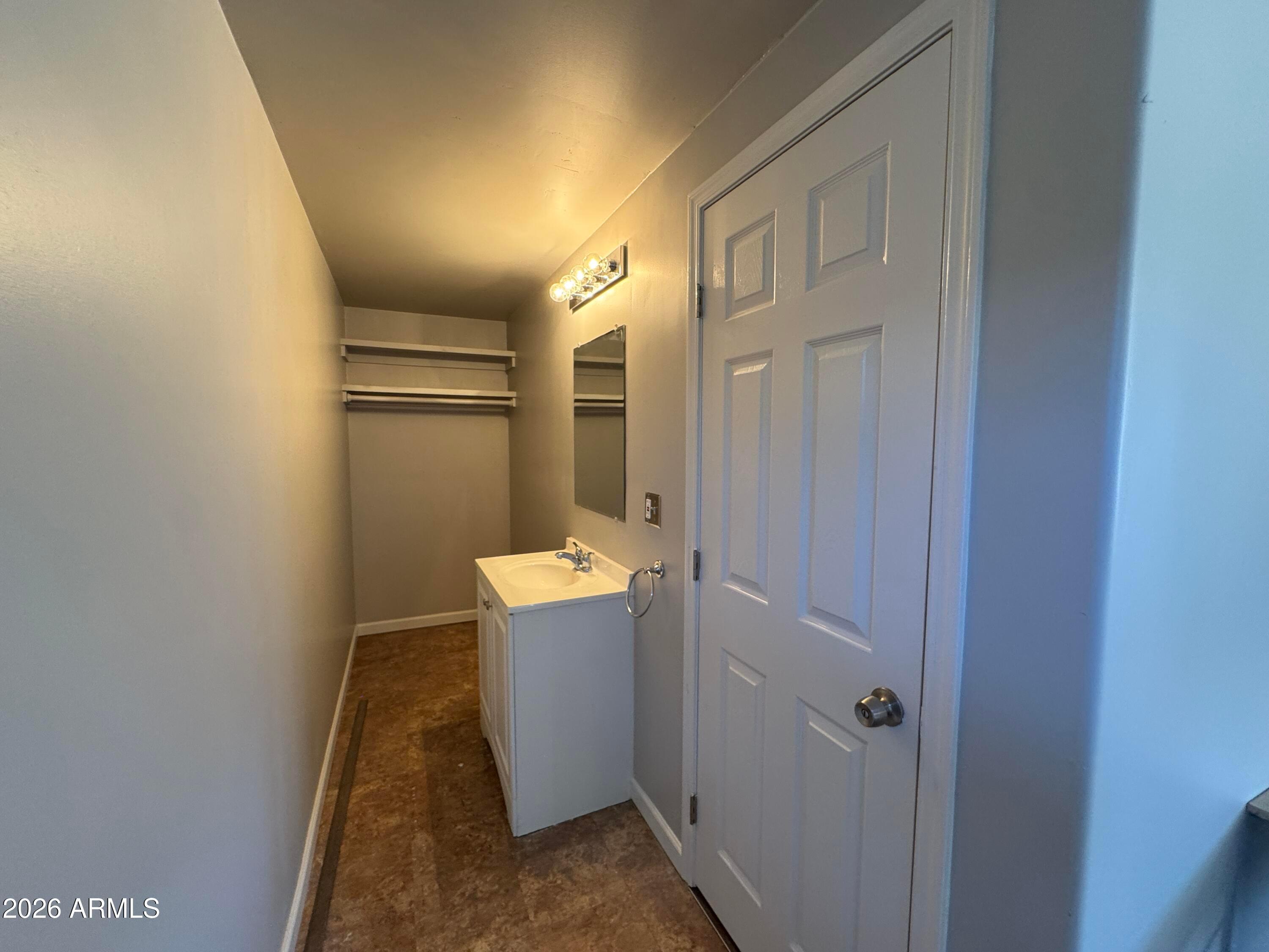 6317 East McLellan Road Mesa, AZ 85205 - Photo 24 of 28 a room with storage and utility