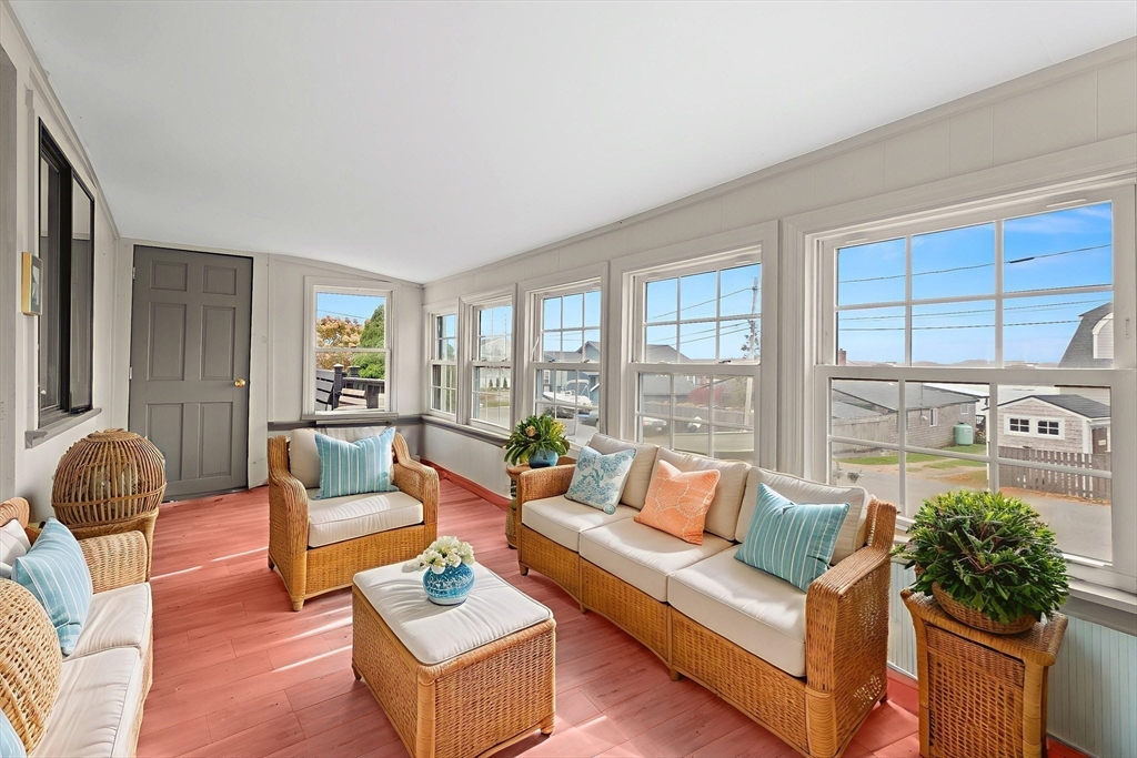 15 Eagle Hill Road Ipswich, MA 01938 - Photo 18 of 41 a living room with furniture and floor to ceiling windows