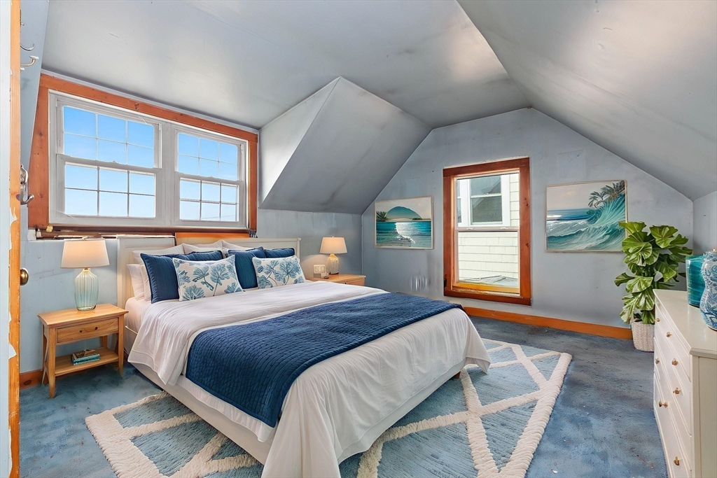 15 Eagle Hill Road Ipswich, MA 01938 - Photo 21 of 41 a bedroom with a large bed and windows