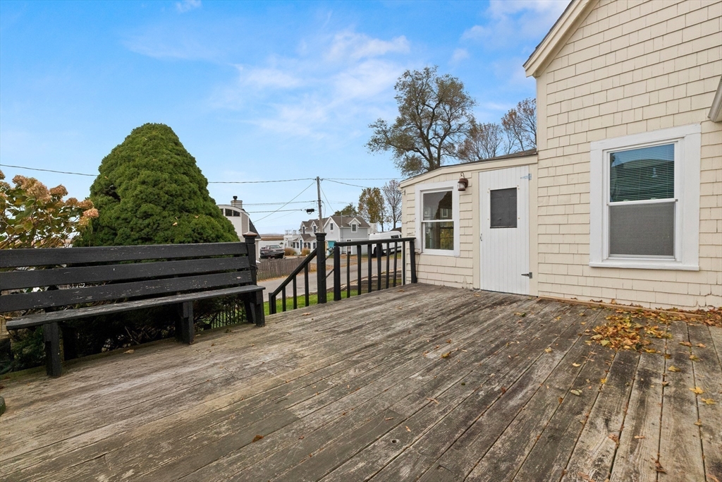 15 Eagle Hill Road Ipswich, MA 01938 - Photo 29 of 41 a view of a house with backyard and deck