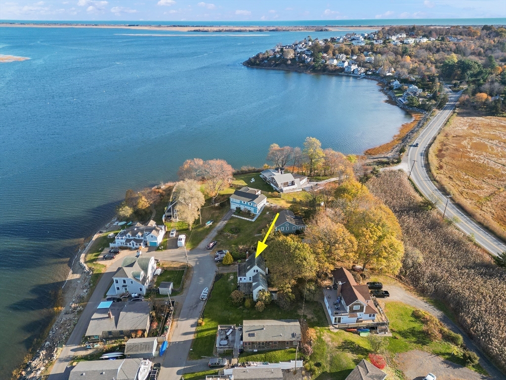 15 Eagle Hill Road Ipswich, MA 01938 - Photo 40 of 41 an aerial view of a house with a lake view