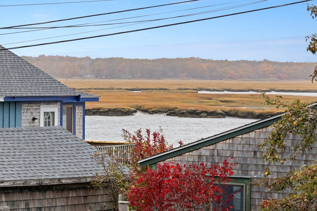 15 Eagle Hill Road Ipswich, MA 01938 - Photo 4 of 41 a view of ocean from a balcony