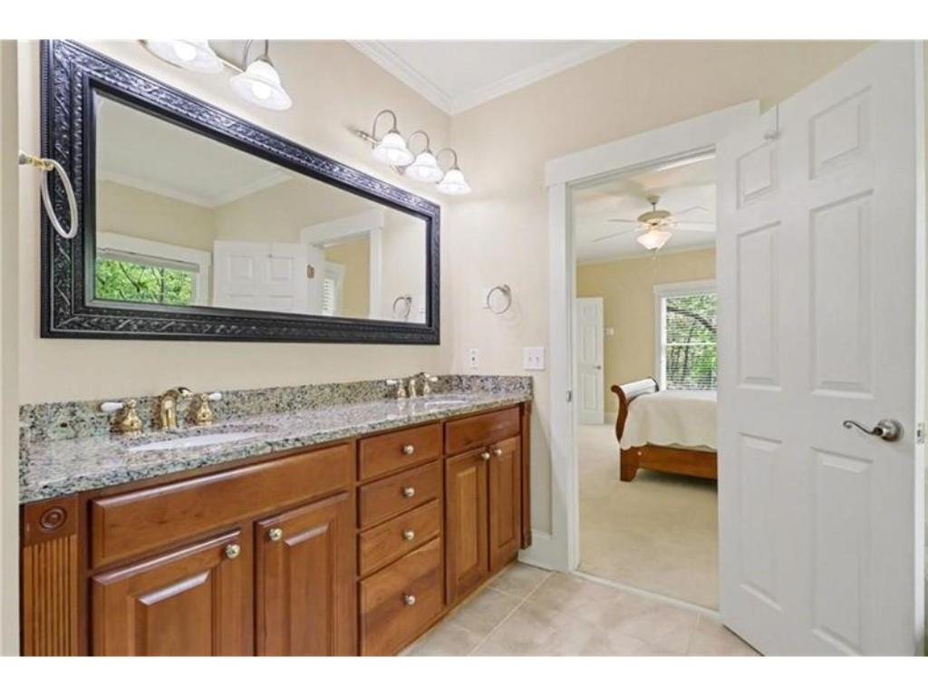 53 Pinto Place Jasper, GA 30143 - Photo 11 of 62 a spacious bathroom with a double vanity sink a mirror and a bathtub