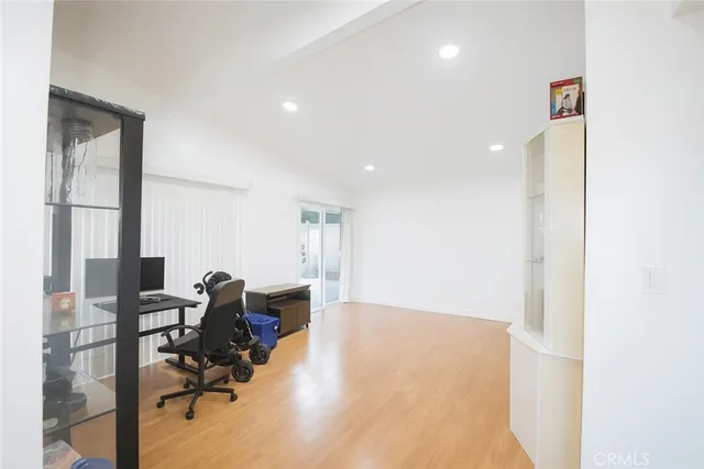 a view of a hallway with a white walls