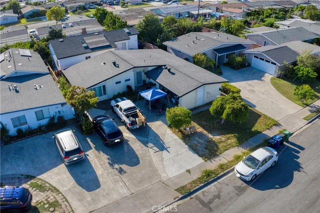 an aerial view of a house with a garden