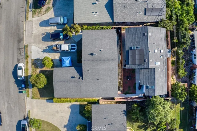 an aerial view of houses with outdoor space