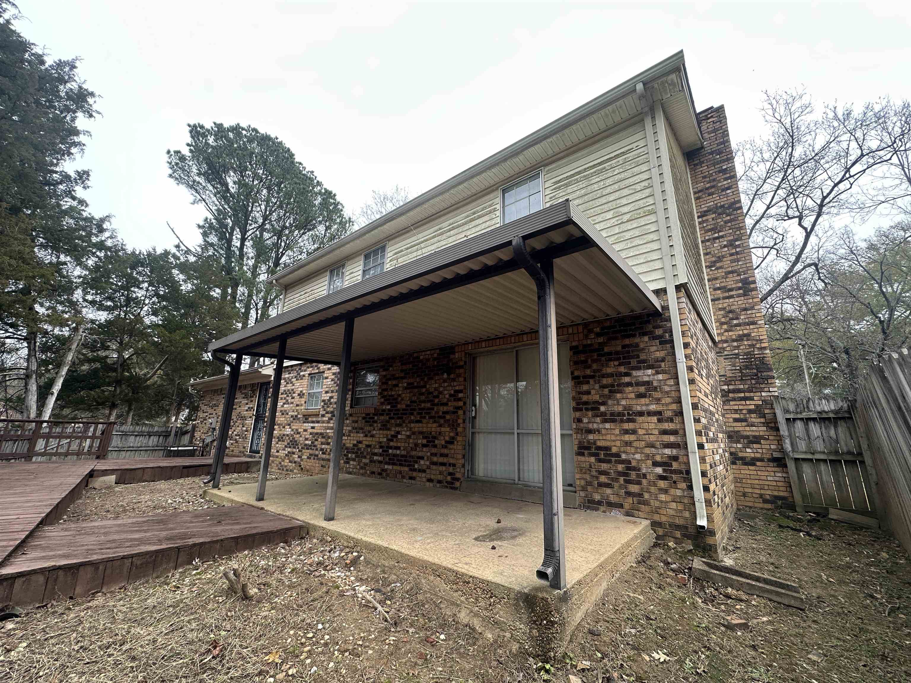 2111 Rock Ridge Road Memphis, TN 38134 - Photo 4 of 20 a view of a house with a yard