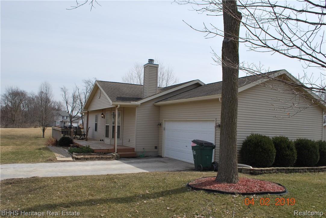 3272 Hogback Road Fowlerville, MI 48836 - Photo 3 of 34 Side exterior