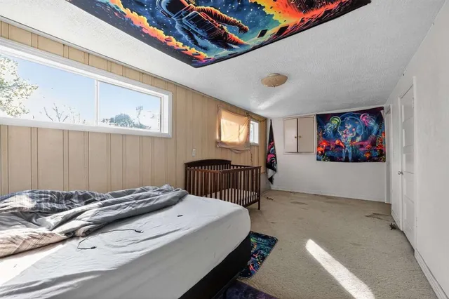 a livingroom with furniture and a window