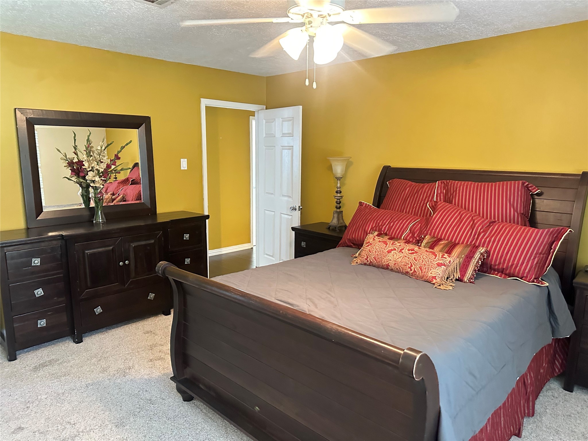 17722 Sorrell Ridge Drive Spring, TX 77388 - Photo 18 of 37 a bedroom with a bed and a flat screen tv