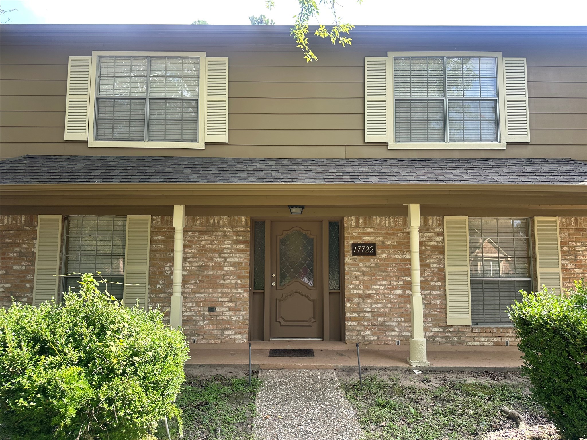 17722 Sorrell Ridge Drive Spring, TX 77388 - Photo 2 of 37 a front view of a house with a garden