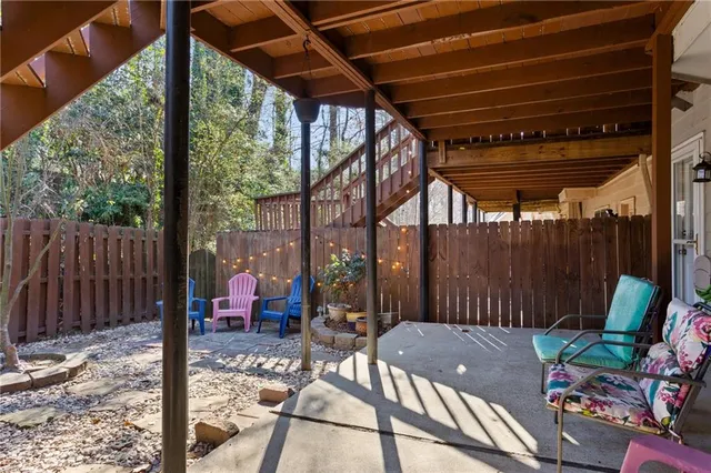 a view of roof with sitting area
