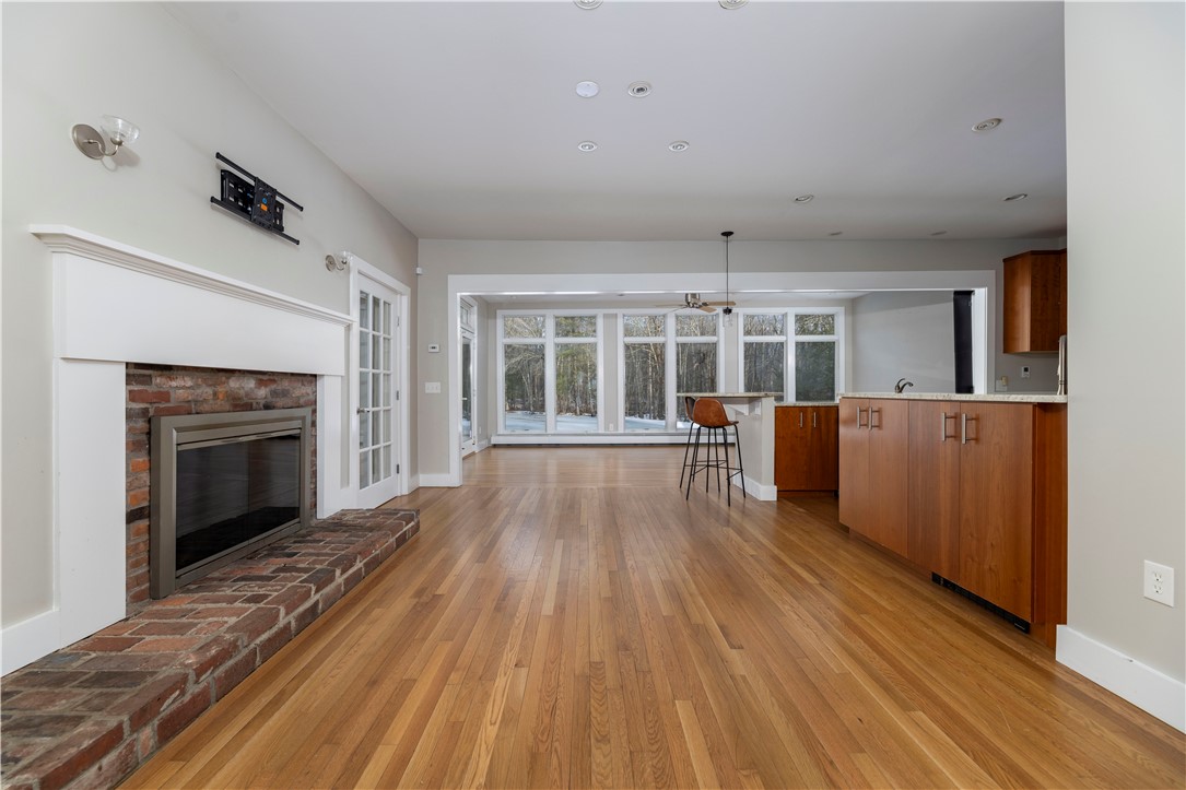 80 Browns Corner Road West Greenwich, RI 02817 - Photo 14 of 47 Living area with wood buring fireplace