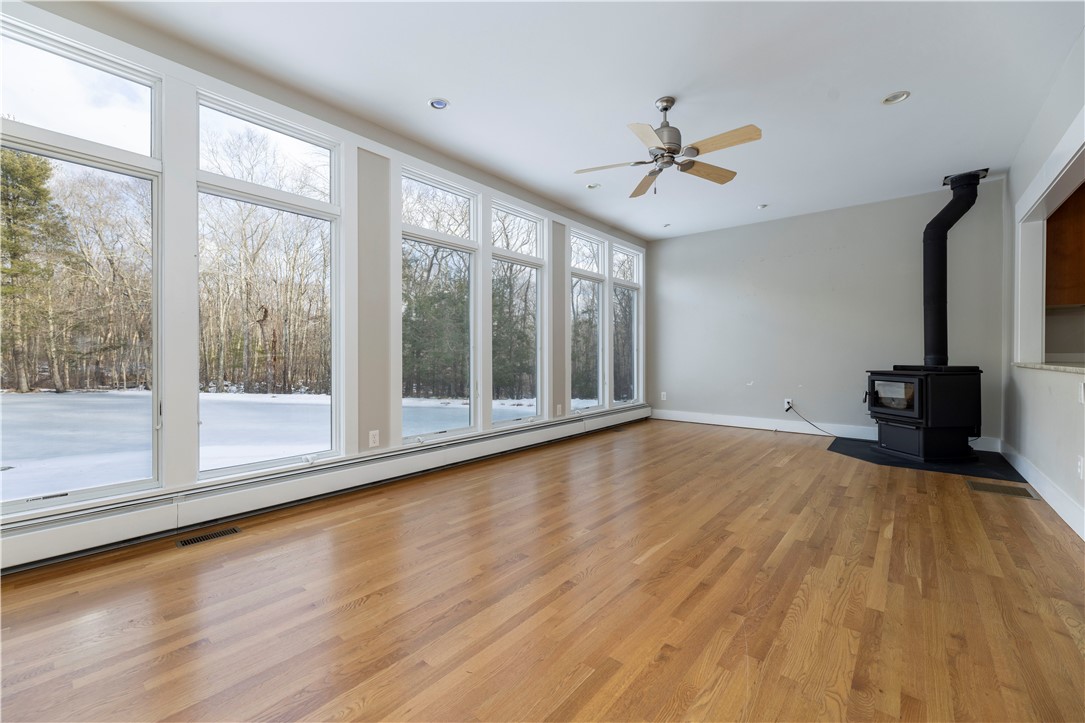 80 Browns Corner Road West Greenwich, RI 02817 - Photo 17 of 47 Living area with wood burning stove