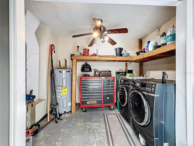 a view of a livingroom with furniture and a flat screen tv