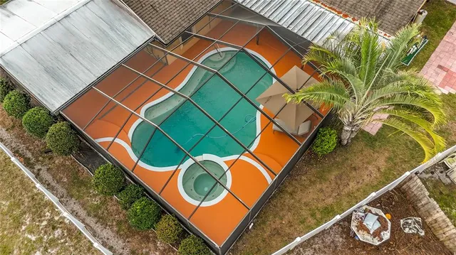 a view of a park with large trees