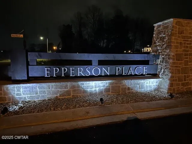 a kitchen with a stove and cabinets