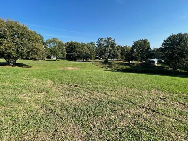 6492 Grimes Road Loudon, TN 37774 - Photo 3 of 9 a view of a field of grass and trees
