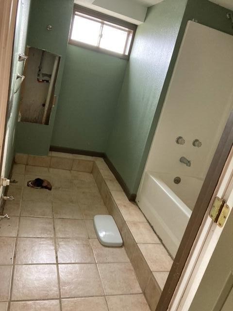 6492 Grimes Road Loudon, TN 37774 - Photo 7 of 9 a bathroom with a tub and shower
