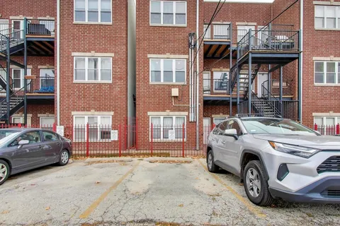 a car parked in front of a house
