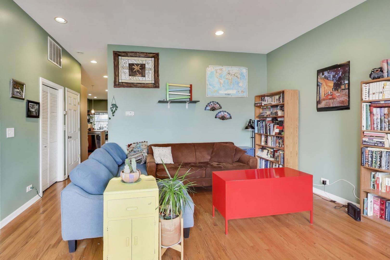 2451 South Western Avenue, Unit 2S Chicago, IL 60608 - Photo 4 of 16 a living room with furniture and a couch