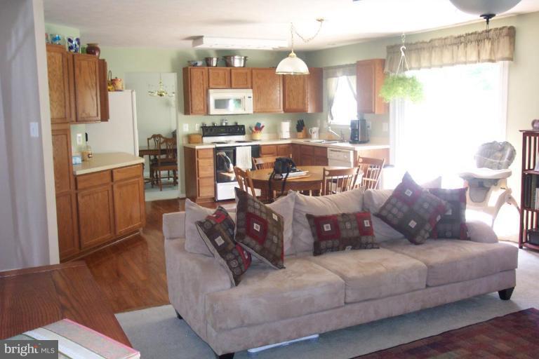 223 Patriots Way Elkton, MD 21921 - Photo 8 of 28 Views of the family room and kitchen area