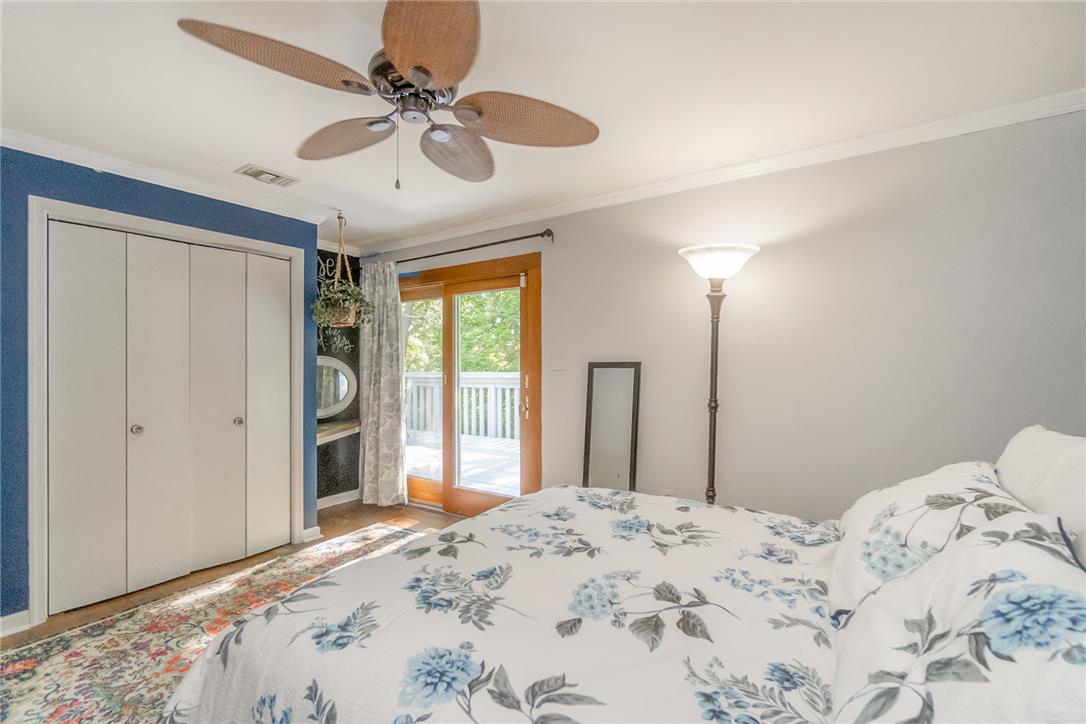 1325 Granger Road Northampton, PA 18067 - Photo 24 of 61 A comfortable bedroom features direct access to an outdoor deck.