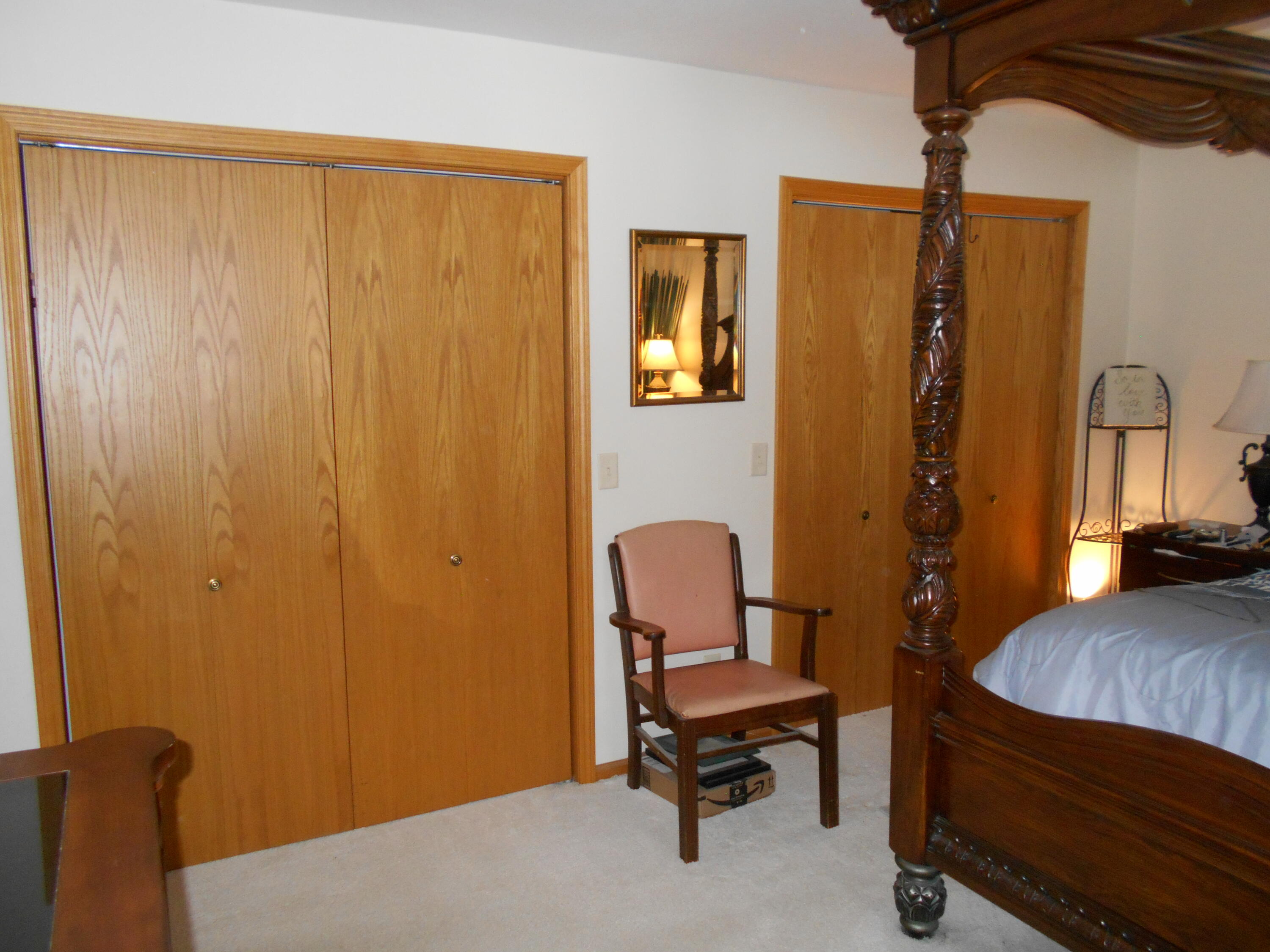 8335 Lamos Road Montague, MI 49437 - Photo 20 of 36 Primary double closets