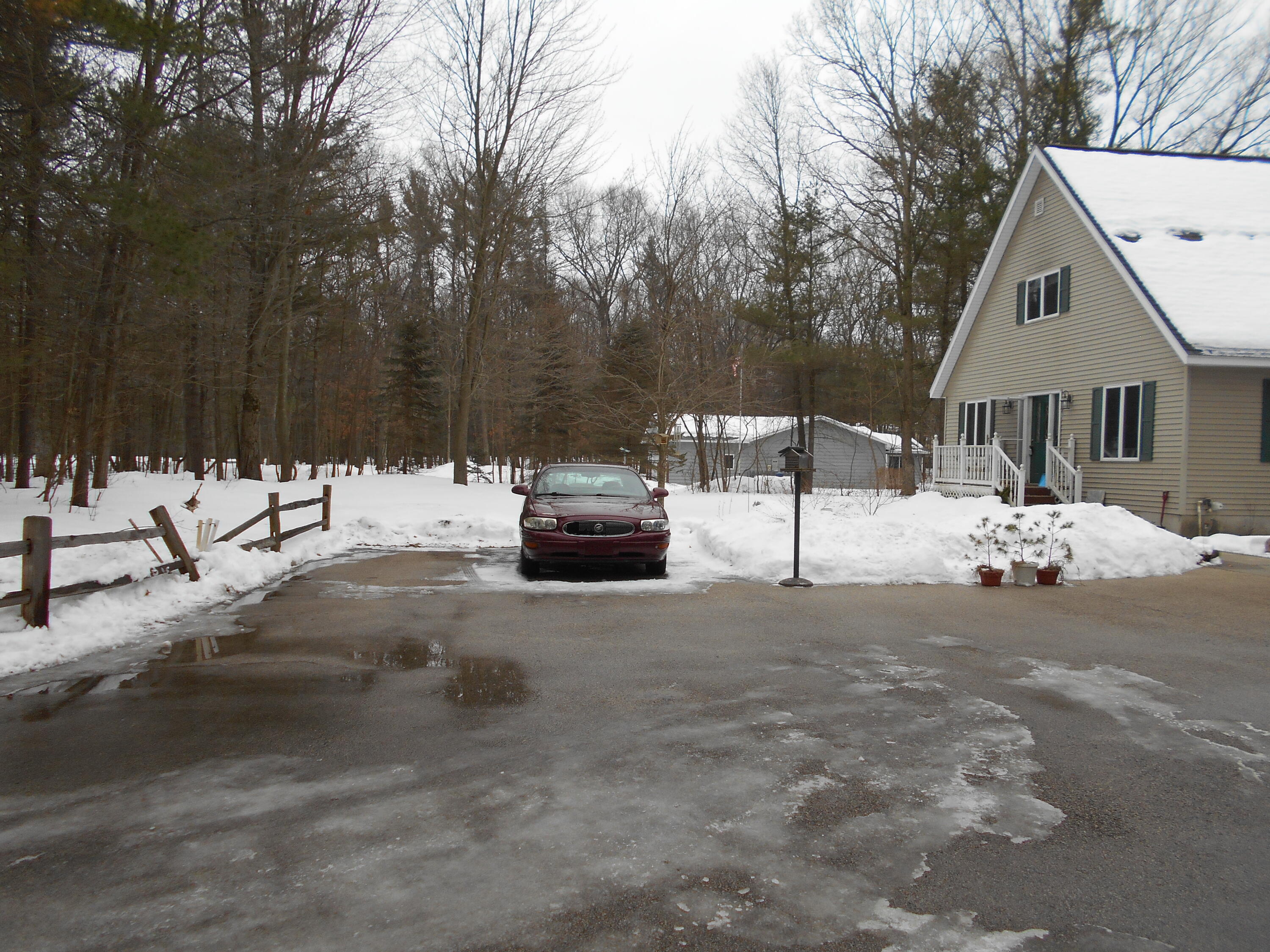 8335 Lamos Road Montague, MI 49437 - Photo 2 of 36 Extra parking pad