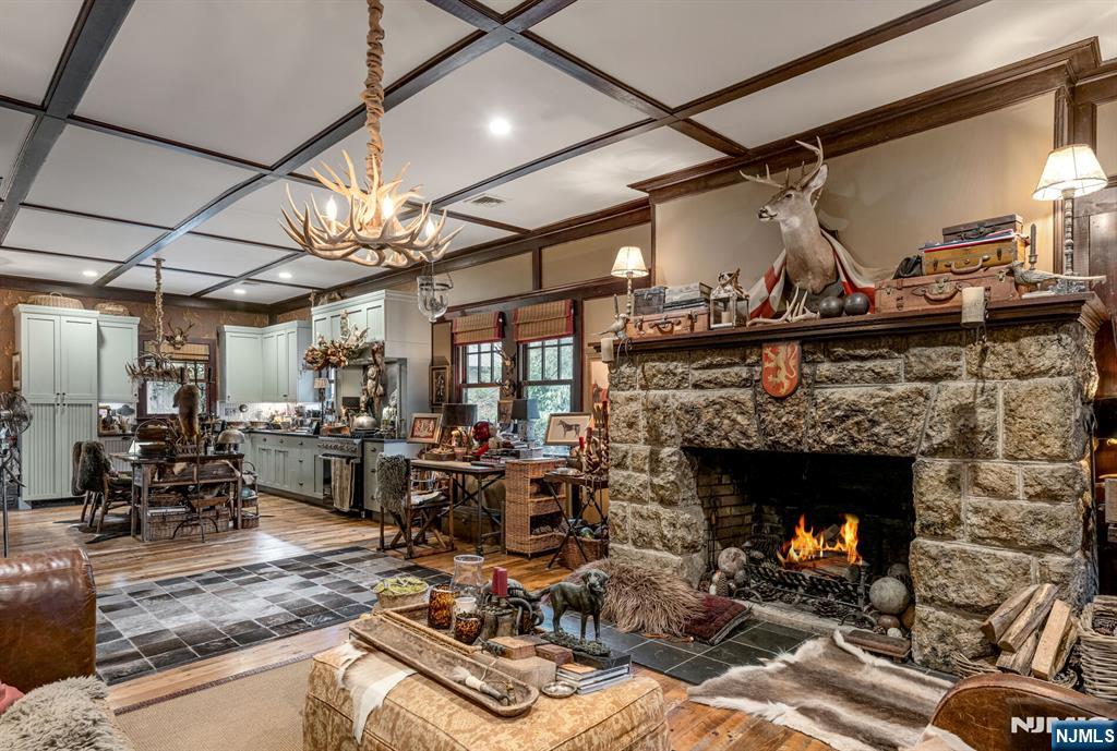 26 Short Road Bloomingdale, NJ 07420 - Photo 13 of 46 a living room with lots of furniture and a fireplace