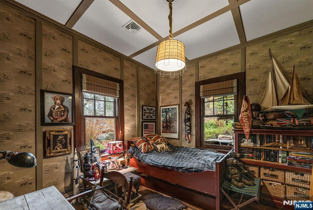 26 Short Road Bloomingdale, NJ 07420 - Photo 23 of 46 a living room filled with furniture