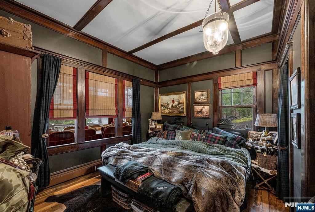 26 Short Road Bloomingdale, NJ 07420 - Photo 29 of 46 a bed sitting in a bedroom next to a window