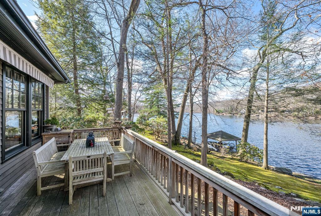 26 Short Road Bloomingdale, NJ 07420 - Photo 36 of 46 a view of backyard with deck and outdoor seating